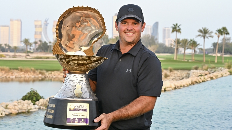 Patrick Reed of the United States celebrates with the trophy following his victory on day four of the Qatar Masters 2026 golf tournament at the Doha Golf Club in Doha, Qatar, on February 8, 2026. (Photo by Noushad Thekkayil/NurPhoto via Getty Images)