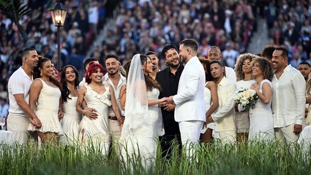Performers portray a wedding during Puerto Rican singer Bad Bunny performance at Super Bowl LX 