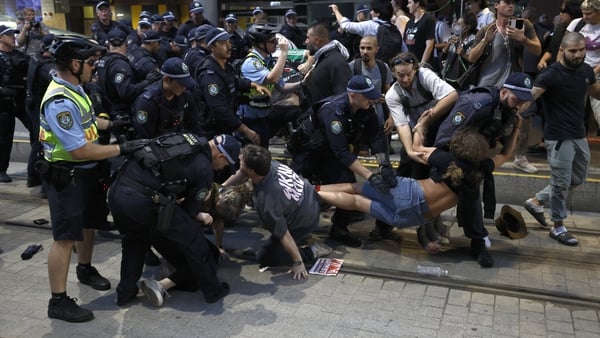 Police scuffle with protesters in sydney