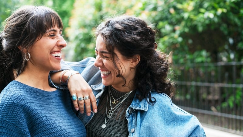 two friends laughing having fun