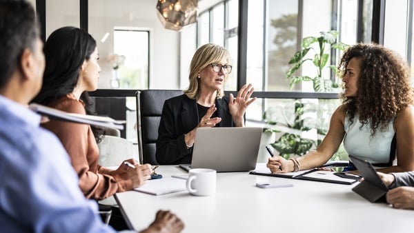 Business colleagues meeting in modern conference room