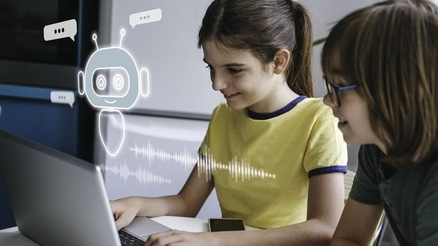 Children using system AI Chatbot in computer or mobile application. 