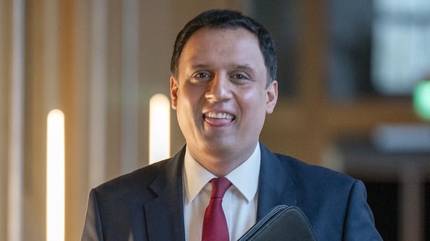 Scottish Labour leader Anas Sarwar carrying a briefing folder 