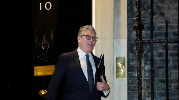 Keir Starmer leaving 10 Downing Street at evening time