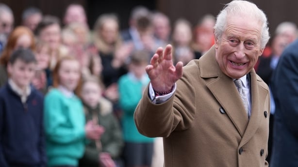 Britain's King Charles III waves as he leaves after a visit to Butlers Dairy in Inglewhite, near Preston, north-west England 