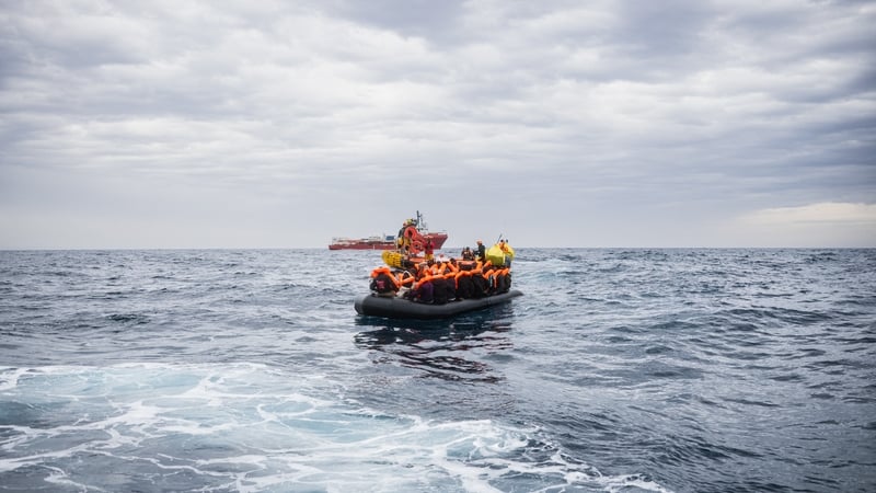Migrants onboard a rubber boat during a rescue off the coast of Libya in January 2026