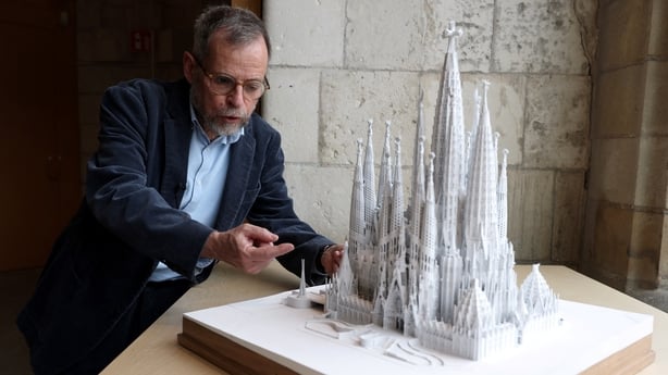 Chief architect of Barcelona's Sagrada Familia Jordi Fauli is pictured as he talks near a scale model of the basilica