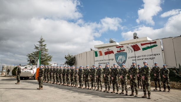 a guard of honour during a visit to Camp Shamrock, in south Lebanon