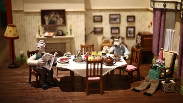 People look at the dining room set model, from Wallace & Gromit: Vengeance Most Fowl, 2024, during a photocall for the Inside Aardman: Wallace & Gromit and Friends exhibition at the Young V&A museum in London on 9 February, 2026