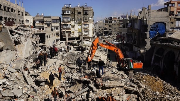 GAZA CITY, GAZA - FEBRUARY 10: Civil defense teams search for the bodies of the members of Palestinian Hudra family, trapped under the rubble of a building destroyed in Israeli attacks, with heavy machinery in the Sheikh Radwan neighborhood of Gaza City, Gaza on February 10, 2026. (Photo by Anas Zey