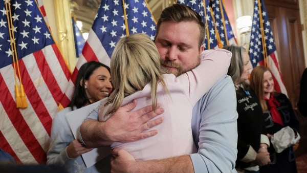 pstein abuse survivor Danielle Bensky hugs Sky Roberts, brother of Virginia Giuffre