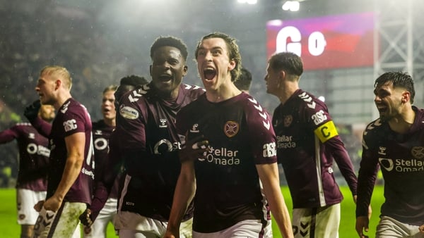 Hearts' Tomas Bent Magnusson, right, celebrates his late goal with team-mates