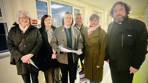 Group of people with petition at airport