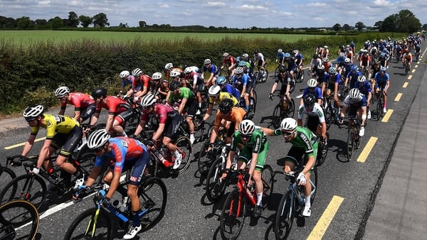15 June 2022; Paul-Antoine Hagan, left, and Rory Townsend of Team Ireland make their along the Dublin Road to Athy together amongst the Peloton during Stage 1 of the Rás Tailteann 2022 at Horse and Jockey in Parkstown, Tipperary. Photo by David Fitzgerald
