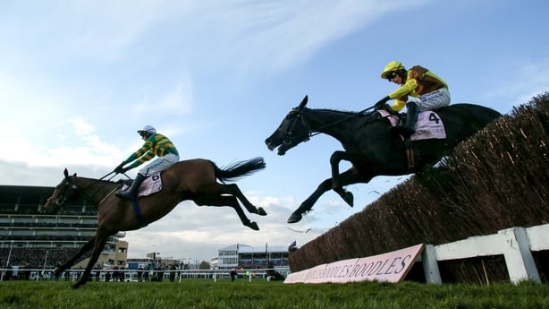 14 March 2025; Galopin Des Champs, with Paul Townend up, jumps the last behind the winner Inothewayurthinkin, with Mark Walsh up, during the Boodles Cheltenham Gold Cup Steeple Chase on day four of the Cheltenham Racing Festival at Prestbury Park in Cheltenham, England. Photo by Harry Murphy/Sportsf