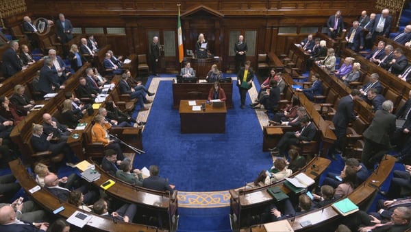 Members of the Dáil seated in the chamber