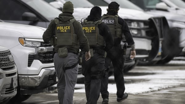 MINNEAPOLIS, MINNESOTA - FEBRUARY 04: ICE agents depart the Bishop Henry Whipple Federal Building on February 4, 2026 in Minneapolis, Minnesota. White House Border Czar Tom Homan announced Wednesday that 700 immigration enforcement personnel would be with