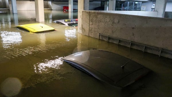 Submerged vehicles pictured this afternoon on Marrsfield Avenue, Belmayne