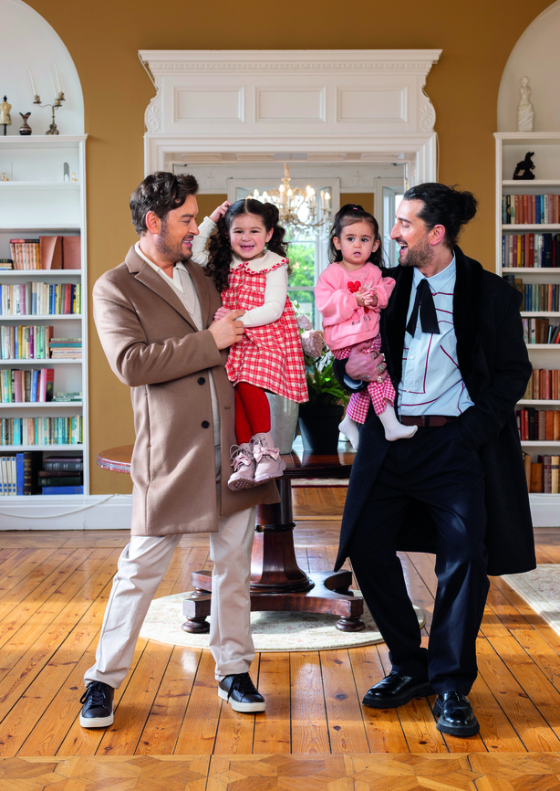 Brian Dowling and Arthur Gourounlian and their two daughters