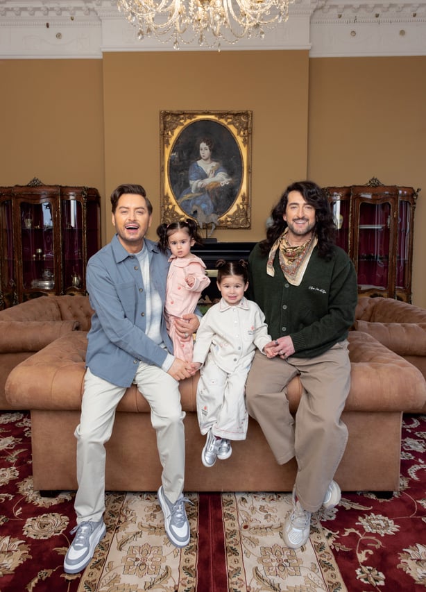 Brian Dowling and Arthur Gourounlian and their two daughters