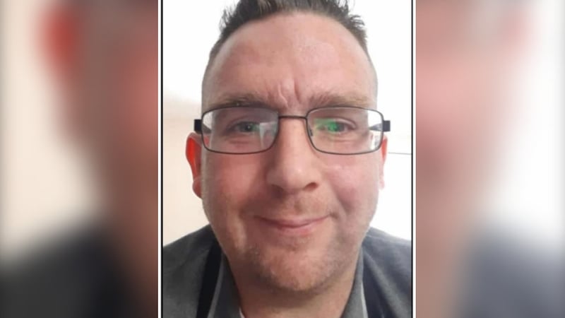 close up of ivan rosney on a distorted background