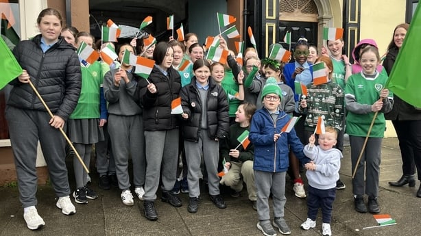 Students from St Brigid's Primary School in Moate prepare to cheer on Anabelle Zurbay