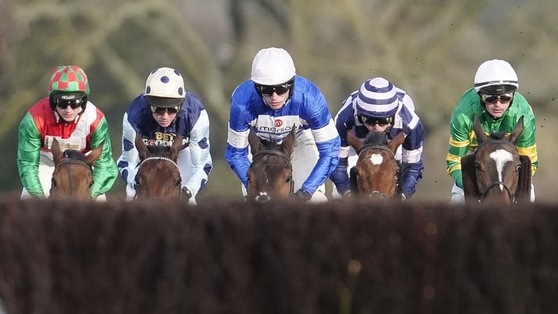 ASCOT, ENGLAND - FEBRUARY 14: Nico de Boinville riding Jonbon (R, green/gold) on their way to winning The Betfair Ascot Chase from Harry Cobden and Pic D'Orhy (C, blue) at Ascot Racecourse on February 14, 2026 in Ascot, England. (Photo by Alan Crowhurst/G