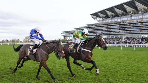 ASCOT, ENGLAND - FEBRUARY 14: Nico de Boinville riding Jonbon (R, green/gold) clear the last to win The Betfair Ascot Chase from Harry Cobden and Pic D'Orhy (blue) at Ascot Racecourse on February 14, 2026 in Ascot, England. (Photo by Alan Crowhurst/Getty Images)