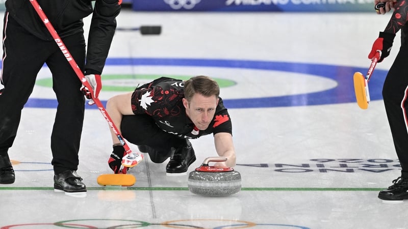 Ben Herbert (L), Marc Kennedy (C) and Brett Gallant of Team Canada compete in the curling men's round robin between Canada and USA during the Milano Cortina 2026 Winter Olympic Games at the Cortina Curling Olympic Stadium in Cortina d’Ampezzo on February