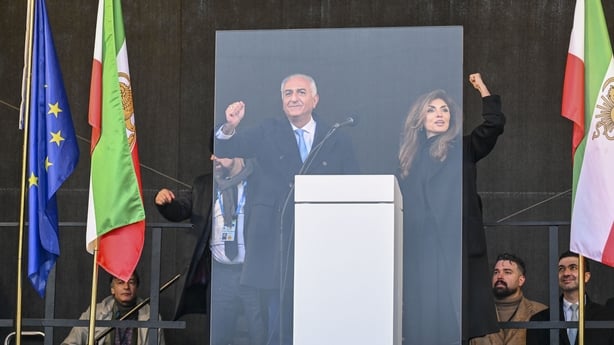 Reza Pahlavi and his wife Yasmine Pahlavi arrived at the demonstration. He is a political dissident and the son of Mohammad Reza Pahlavi, the deposed shah of Iran, speaks to people protesting for human rights in Iran at Theresienwiese during the 62nd Munich Security Conference