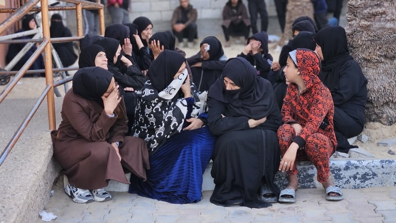 Relatives and loved ones of Palestinians, who lost their lives in an Israeli attack, mourn for their deceased ones at Nassar Hospital during their funeral procedures in Khan Yunis, Gaza
