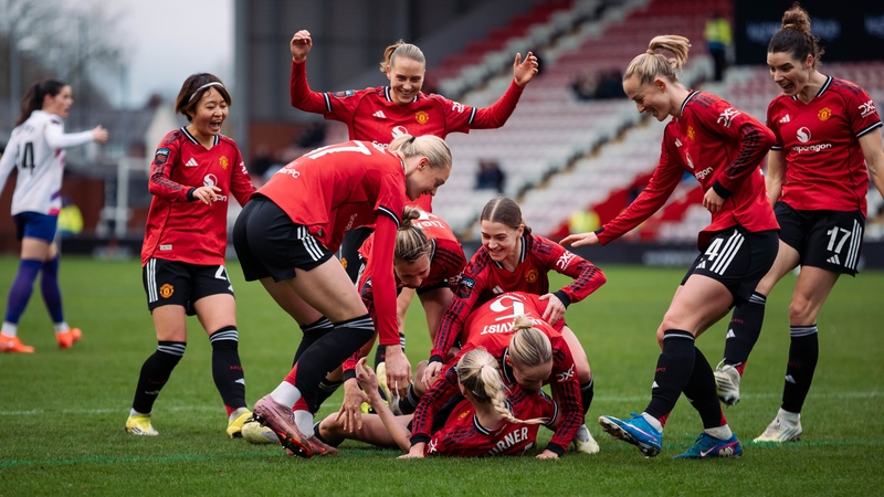 Millie Turner of Manchester United celebrates scoring her teams second goal with teammates during the Barclays Women's Super League match between Manchester United and London City Lionesses at Progress with Unity Stadium on February 15, 2026 in