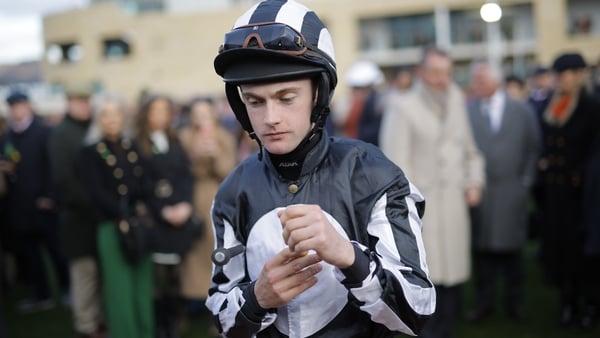 Alan O'Sullivan, the brother of jockey Michael O'Sullivan who died after a fall last month, prepares to mount his horse Walking On Air in the Fulke Walwyn Kim Muir Challenge Cup Amateur Jockeys Handicap Steeplechase during racing on day three of the Chelt