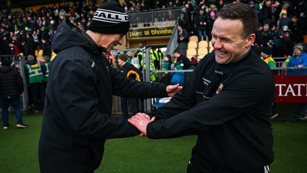 Donegal manager Jim McGuinness, left, shakes hands with Mayo manager Andy Moran after the game at O'Donnell Park in Letterkenny
