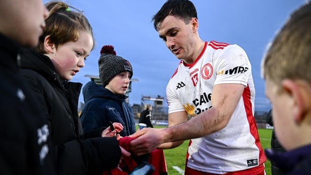 15 February 2026; Darragh Canavan of Tyrone with supporters after the Allianz Football League Division 2 match between Tyrone and Cavan at O'Neill's Healy Park in Omagh, Tyrone. Photo by Ben McShane/Sportsfile