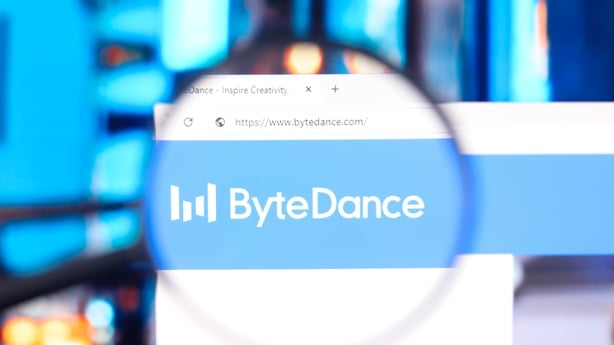 ByteDance logo displayed through a magnifying glass