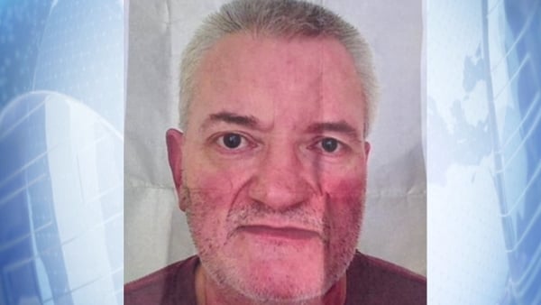 close up of Noel Twomey on a blue background