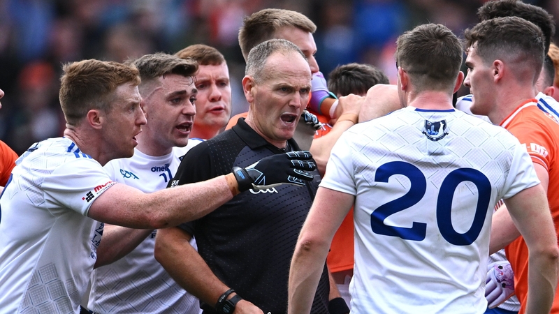 1 July 2023; Referee Conor Lane with players after he blew the full-time whistle at the end of normal time during the GAA Football All-Ireland Senior Championship quarter-final match between Armagh and Monaghan at Croke Park in Dublin. Photo by Piaras Ó M