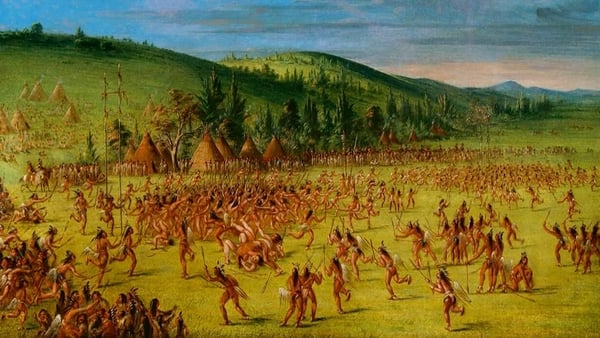 Painting of scores of American Indians playing stickball on a vast dusty plain with hills behind it