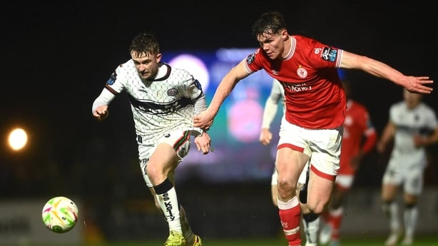 14 February 2026; Darragh Power of Bohemians in action against Gareth McElroy of Sligo Rovers during the SSE Airtricity Men's Premier Division match between Sligo Rovers v Bohemians at The Showgrounds in Sligo. Photo by Tom Beary/Sportsfile