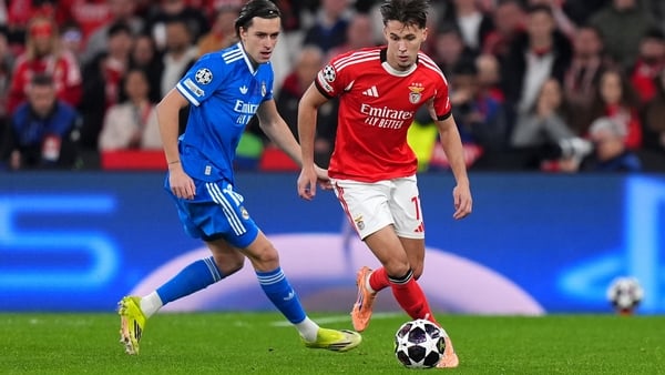 mar Dedic of Benfica is challenged by Alvaro Carreras of Real Madrid during the UEFA Champions League 2025/26 League Knockout Play-off First Leg match between SL Benfica and Real Madrid C.F. at Estadio do SL Benfica on February 17, 2026 in Lisbon, Portuga
