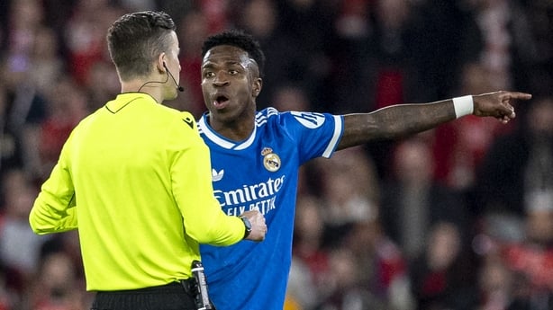 Vinícius Júnior of Real Madrid gestures reacting to racist abuse from fans during the UEFA Champions League 2025/26 League Knockout Play-off First Leg match between SL Benfica and Real Madrid C.F. at Estadio do SL Benfica on February 17, 2026 in Lisbon, Portugal. (Photo by Joao Bravo/Sports Press Ph
