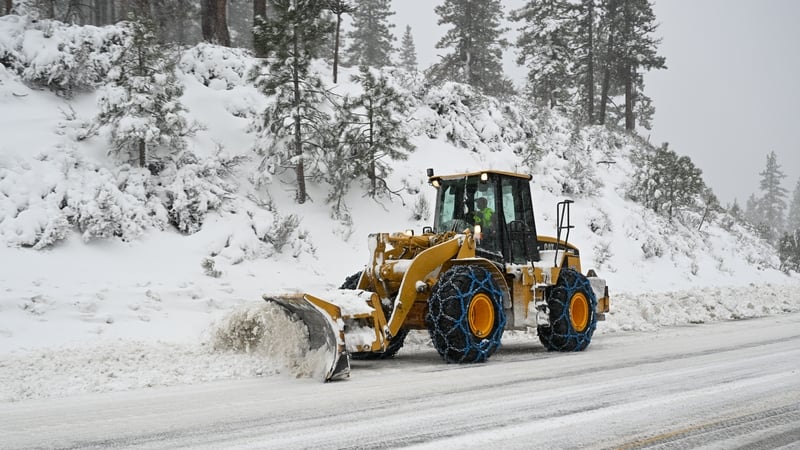 CALIFORNIA, USA - MARCH 1: A snowplow clear snow from roads in Lake Tahoe, California, United States on March 1, 2024 as blizzard warning issued for California's Sierra Nevada. (Photo by Tayfun Coskun/Anadolu via Getty Images)
