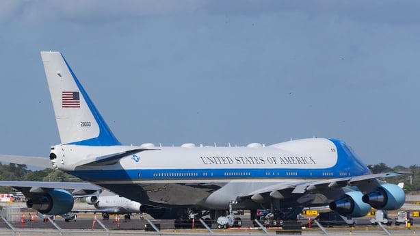A plane known as air force one is seen on a runway