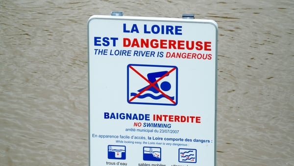 Warning sign for high water level in the Loire river near Amboise, France