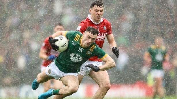 24 May 2025; Jordan Morris of Meath is tackled by Daniel O'Mahony of Cork during the GAA Football All-Ireland Senior Championship Round 1 match between Meath and Cork at Páirc Tailteann in Navan, Meath. Photo by Thomas Flinkow/Sportsfile