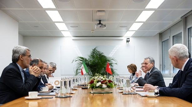 Iran's Foreign Minister Abbas Araghchi and Switzerland's Foreign Minister Ignazio Cassis attend a bilateral meeting between Switzerland and Iran during a second round of US-Iranian talks with Washington pushing Tehran to make a deal to limit its nuclear programme, in Geneva 
