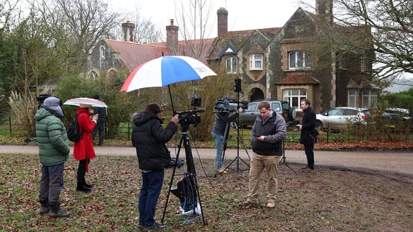 SANDRINGHAM, NORFOLK - FEBRUARY 19: The media gather to report near the home of Andrew Mountbatten-Windsor on February 19, 2026 in Sandringham, Norfolk. Andrew Mountbatten-Windsor has been arrested on suspicion of misconduct in public office, following po