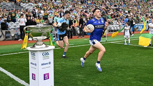 27 July 2025; Paudie Clifford of Kerry passes the Sam Maguire cup and he runs onto the pitch before the GAA Football All-Ireland Senior Championship final match between Kerry and Donegal at Croke Park in Dublin. Photo by Seb Daly/Sportsfile