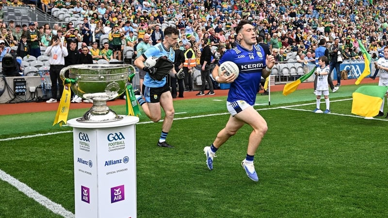 27 July 2025; Paudie Clifford of Kerry passes the Sam Maguire cup and he runs onto the pitch before the GAA Football All-Ireland Senior Championship final match between Kerry and Donegal at Croke Park in Dublin. Photo by Seb Daly/Sportsfile